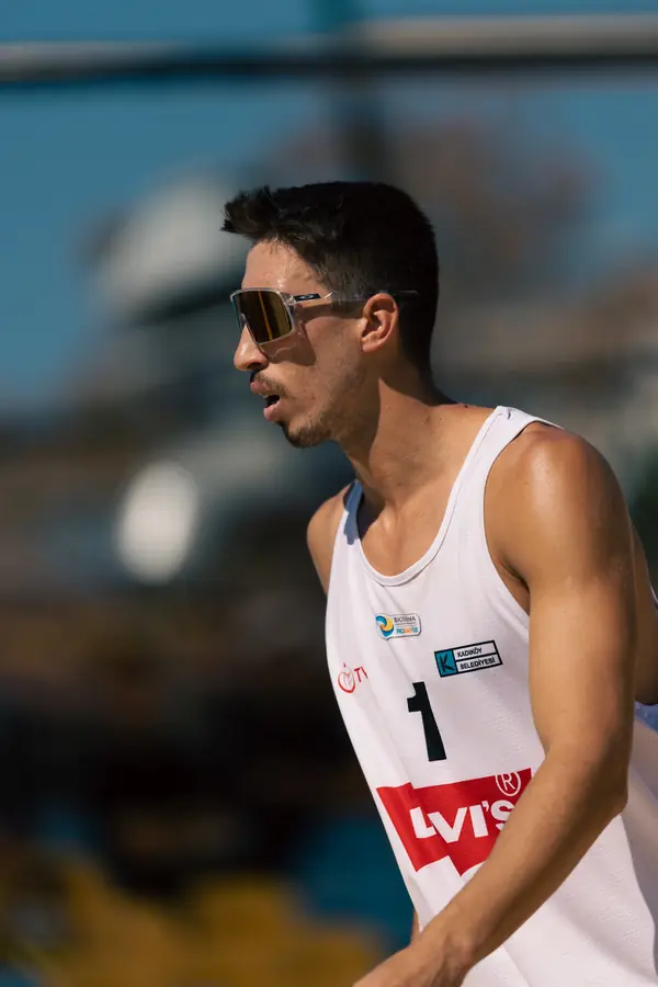 Male player, number 1, in profile against a blurred background